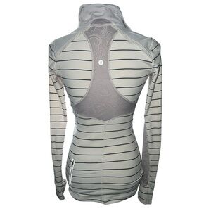 Lululemon women’s striped long sleeve top with lace and ruffle detail